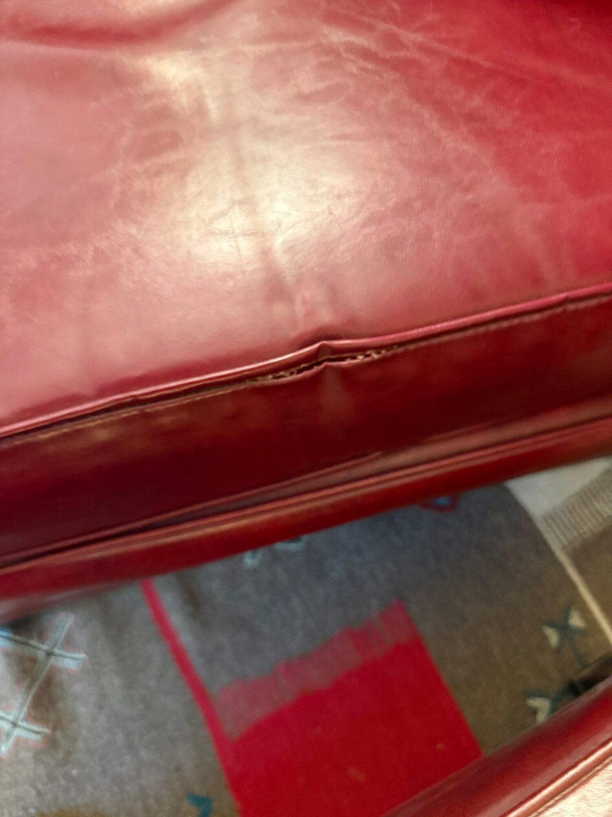 Seat cushion detail showing wear