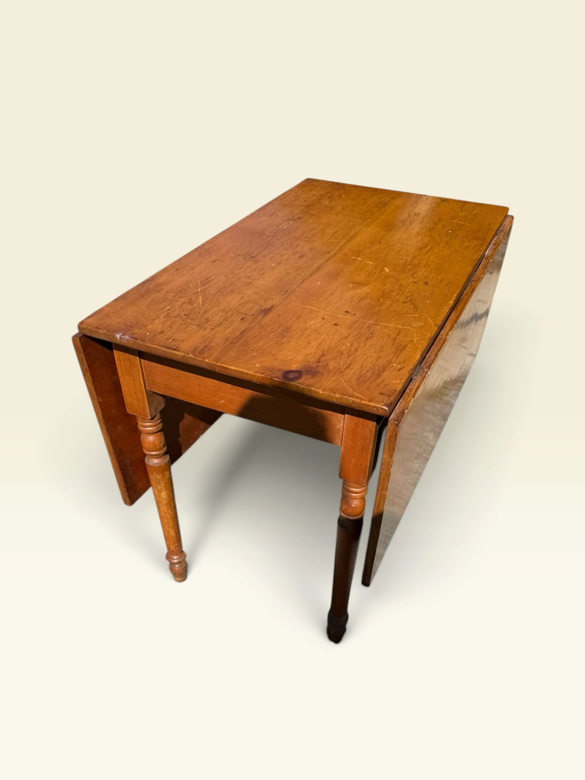 Antique drop-leaf farm table