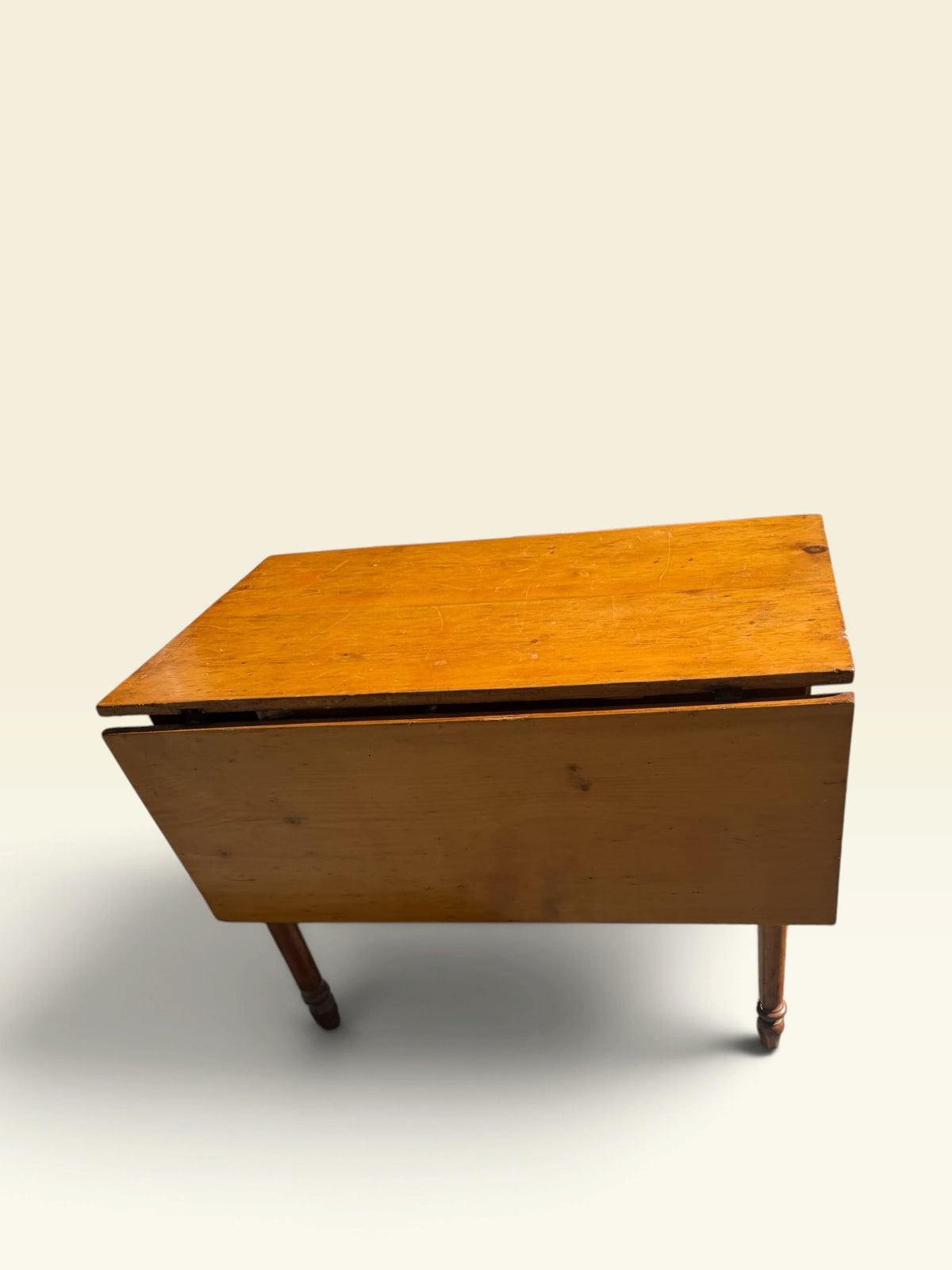 Antique drop-leaf farm table, leaves down