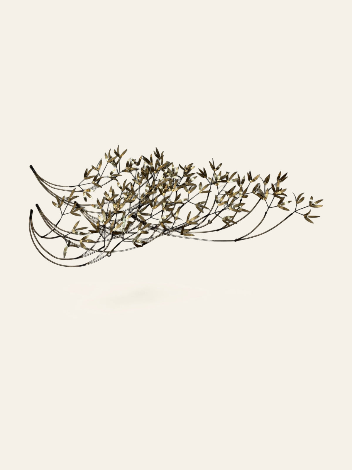 Mid-century brass metal botanical wall sculpture with sweeping branches and leaves