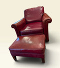 Oxblood vinyl club chair and ottoman