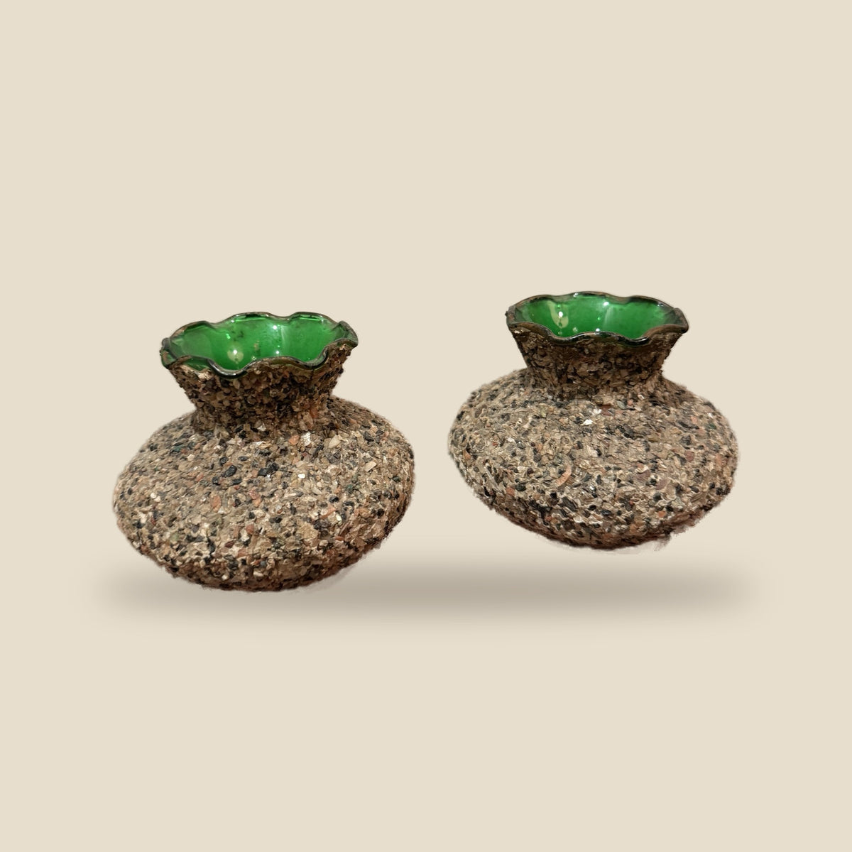 Pair of pebble-encrusted green glass bud vases